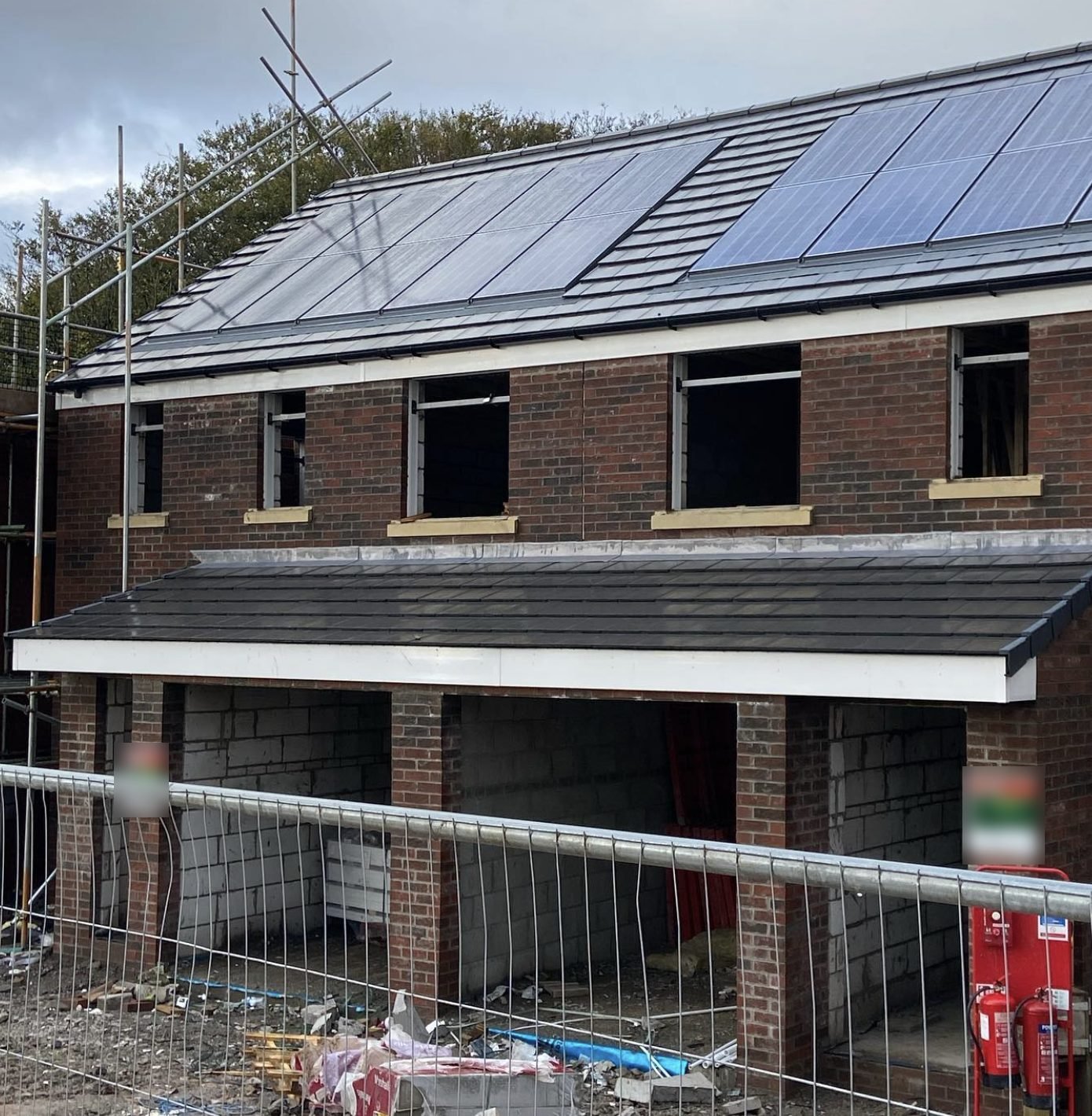 Tiled main roof and lean-to garage roof on a new-build home